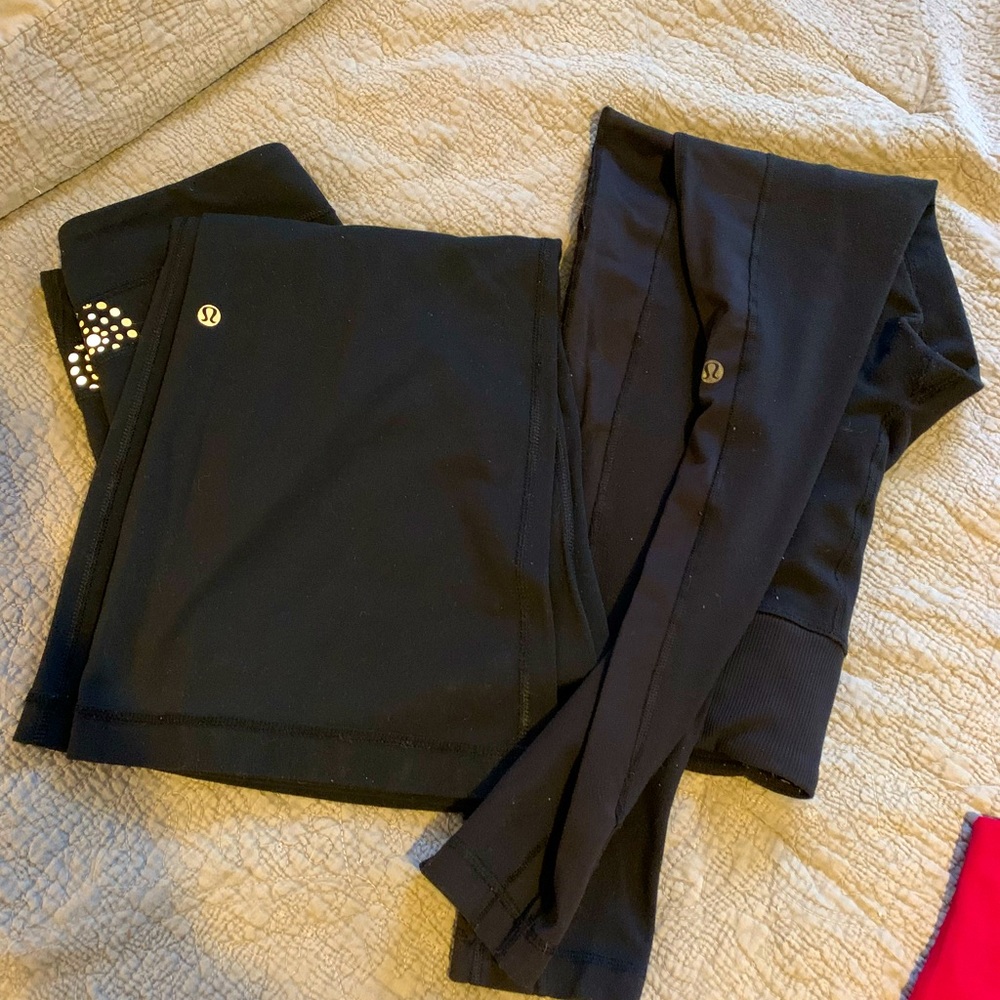 2 pairs of Lulu leggings - 1 flare 1 fitted $40 for both